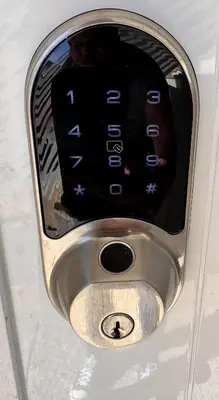 a close up of a remote control in a car door at Stylish 2 Bedrooms Apartment by Miami Airport in Miami