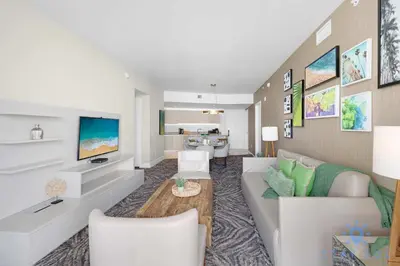 a living room with a couch and a tv at 2 BR Apartment with Amenities and Balcony in Hollywood