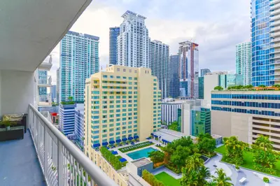 a balcony with a view of a city at Relax & Live The Miami Exp in Our Comfy Condo in Miami