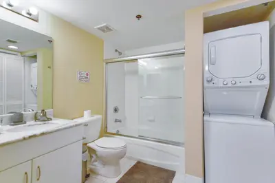 a bathroom with a toilet and a sink and a shower at Relax & Live The Miami Exp in Our Comfy Condo in Miami