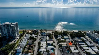an aerial view of a parking lot next to the ocean at Beachside Studio in Hollywood