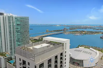 an aerial view of a large city with a harbor at 1BR Apartment - Pool & Gym in Miami