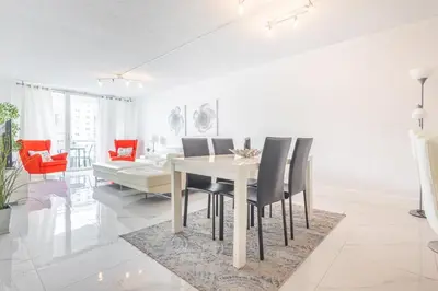 a dining room with a table and chairs at Ocean Reserve in South Island