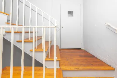 a staircase with a skateboard sitting on top of it at Ocean Villa in Miami Beach