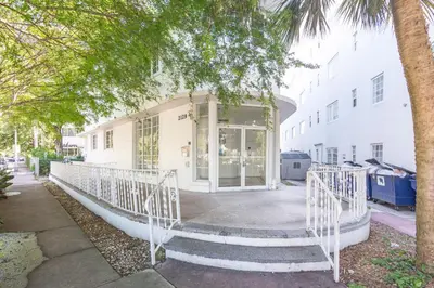 a white building with a staircase in front of it at Convention Center in Miami Beach