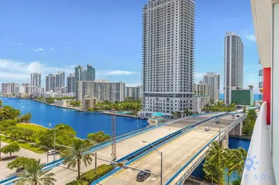a view of a city with a river and buildings at Studio Miami Views - Amenities in Hallandale Beach