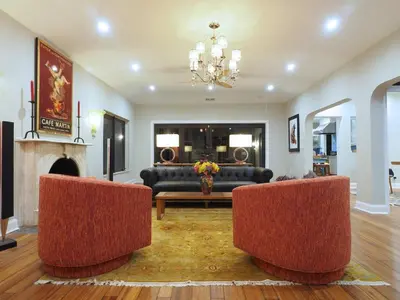 a living room with two chairs and a couch at Beach Estate Las Olas Beach Best Location in Fort Lauderdale