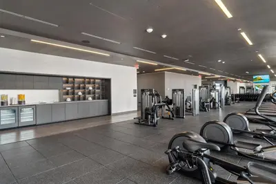 a gym with treadmills and elliptical machines at Stunning Views Dwntwn Miami 2BR Unit - Floor 28th in Miami