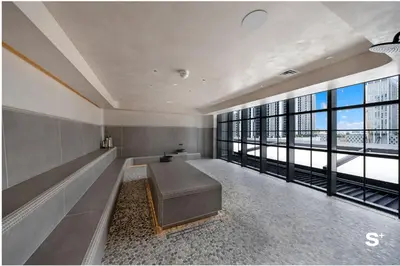 a large room with a couch and large windows at Luxury Studio in DTW Miami with City Views in Miami