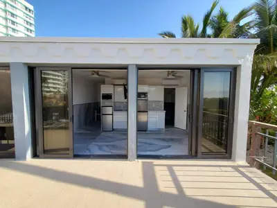 a room with sliding glass doors on a house at Alexander 1620 in Miami Beach