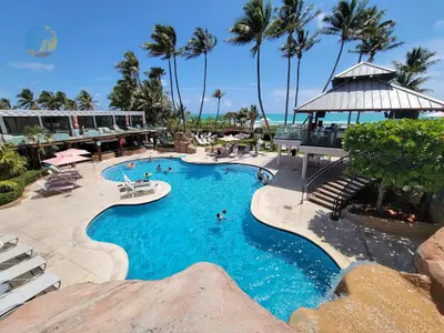 a pool at a resort with people in it at Alexander 1701 in Miami Beach