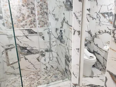 a bathroom with a shower and a toilet at Alexander 807 in Miami Beach
