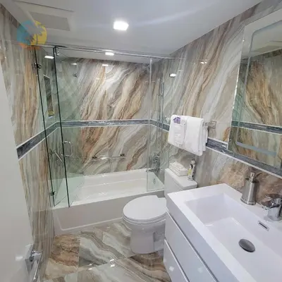 a bathroom with a toilet and a shower and a sink at Alexander 821 in Miami Beach
