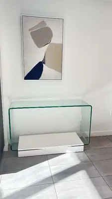 a glass table in a room with a picture on the wall at Rare Corner Unit Private Terrace & Sunset Views in Miami