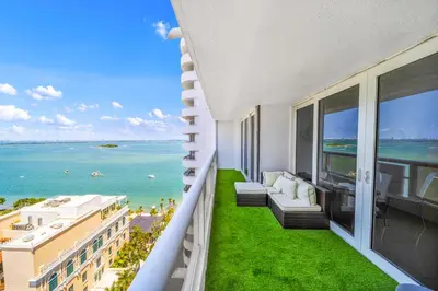 a balcony with a view of the ocean at The Grand Wonder Biscayne in Miami