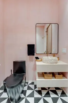 a bathroom with a sink and a mirror at Artisan Studio- Breakfast Nook by Design District in Miami