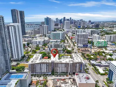 an aerial view of a city with tall buildings at Stylish 1BR Unit With Free Parking Near Wynwood in Miami