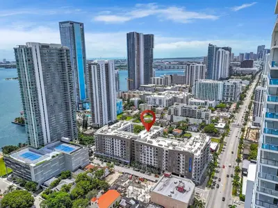 an aerial view of a city with tall buildings at Stylish 1BR Unit With Free Parking Near Wynwood in Miami