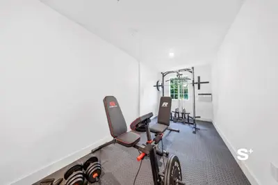 a gym with bikes parked in a room at Stylish Studio - Parking & Gym Near Aventura in Miami