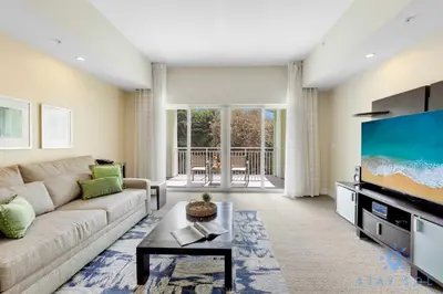 a living room with a couch and a tv at Stylish Apartment 1BR - 2BTH in Miami