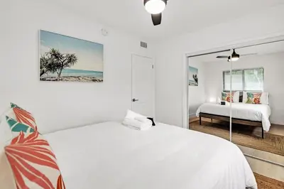 a white bedroom with a bed and a window at Rent in Fort Lauderdale near Broward Medical in Fort Lauderdale