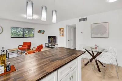 a kitchen with a wooden counter top and a table at Rent in Fort Lauderdale near Broward Medical in Fort Lauderdale