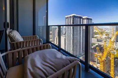 a room with two chairs and a large window at Splendid 1 Bed - Amazing views in Miami