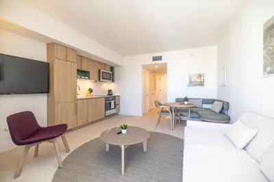 a living room with a couch and a table at Splendid 1 Bed - Amazing views in Miami