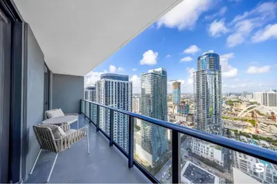 a balcony with a view of a city at Modern DTW Miami Escape with Water Views in Miami
