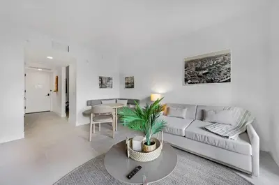 a living room with a couch and a table at Upscale 1-BD Condo in DTW Miami - City Views in Miami