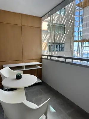 a room with a table and chairs and a window at Brickell-AKA Free Parking by Palermo Home Miami in Miami