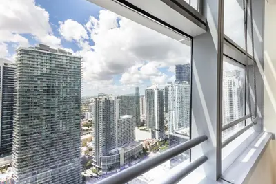 an office window with a view of a city at Brickell AKA 32th Free Parking by Palermo Home Miami in Miami