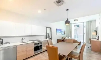 a kitchen and dining room with a table and chairs at Ocean Dream at Costa Hollywood in Hollywood