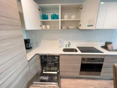 a kitchen with a sink and a dishwasher at A Fantastic apart with balcony and partial view of the beach 4 Px in Hollywood