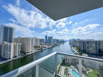 a view of a river from a balcony at Luxury 3 bedroom condo with pool in Hallandale Beach