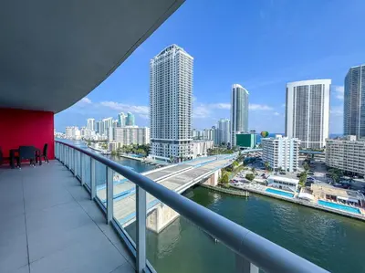 a view of a city from the balcony of a building at Luxury 3 bedroom condo with pool in Hallandale Beach