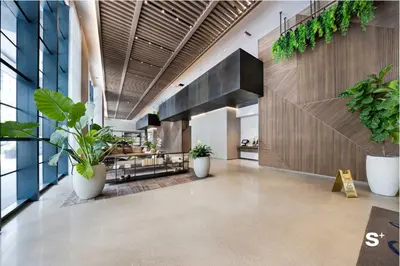 a hallway with potted plants in a building at Studio in DTW Miami - City Views & Gym in Miami
