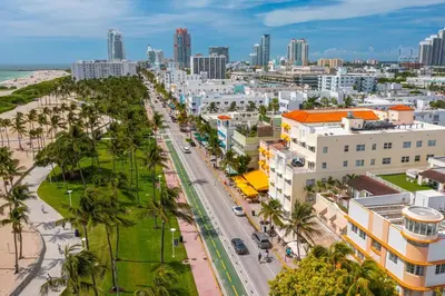 an aerial view of a city with buildings and palm trees at One block from beach South Beach Ocean Dr-King Bed in Miami Beach