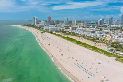 an aerial view of a beach and the ocean at One block from beach South Beach Ocean Dr-King Bed in Miami Beach