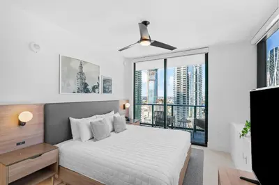 a bedroom with a bed and a large window at Luxury 2-Bdrm Condo in the Heart of Downtown Miami in Miami