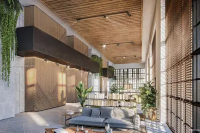 a living room with a blue couch in a building at 2 bedroom Stylish Condo Downtown Pool Gym spa in Miami