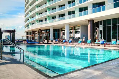a swimming pool in front of a hotel at Live The Perfect Vacations in a Condo From The High in Hollywood