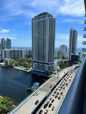 a bridge over a river with cars on a highway at Beautiful Studio in Hallandale with Beach & Pool in Hallandale Beach