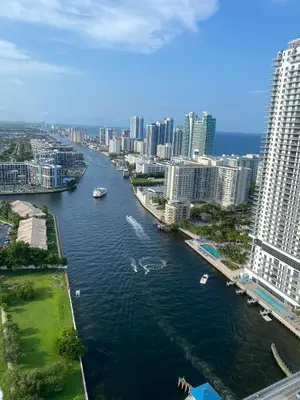 a river in a city with boats in the water at 2B 2B Relax in Miami Beach and Luxury services in Hallandale Beach