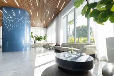 a living room with a couch and a table at Enjoy Miami 2B 2B pool beach and Aventura Mall in Hallandale Beach