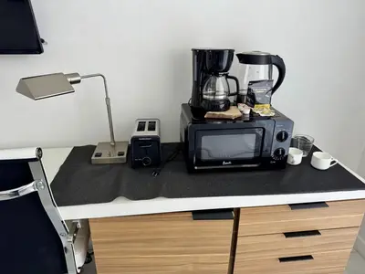 a microwave sitting on top of a counter at Getaway in Miami 2B 2B beachfront near Aventura 3003 in Hallandale Beach