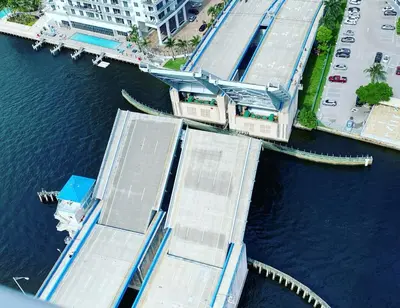 an overhead view of a bridge over a body of water at Ocean Gym Pool Restaurant All in one Place 2B 1506 in Hallandale Beach