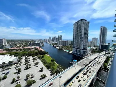 a view of a city with a bridge and a river at Near Aventura Mall 2B 2B with beach and pool 2403 in Hallandale Beach