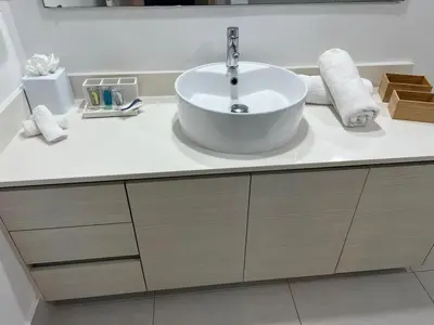 a bathroom with a sink and a white counter at Miami Beautiful with kitchen, pool and mall Apmt 1B 1B 1408 in Hallandale Beach