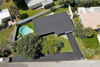 an overhead view of a house with a swimming pool at Chic 3BR 2BA Getaway with Private Pool Oasis in Fort Lauderdale